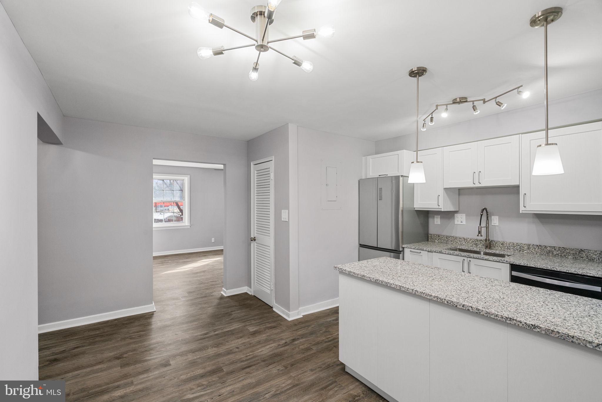 2404 Colston Drive, Unit 103 Silver Spring, MD 20910 - Photo 11 of 20 Kitchen view toward living room