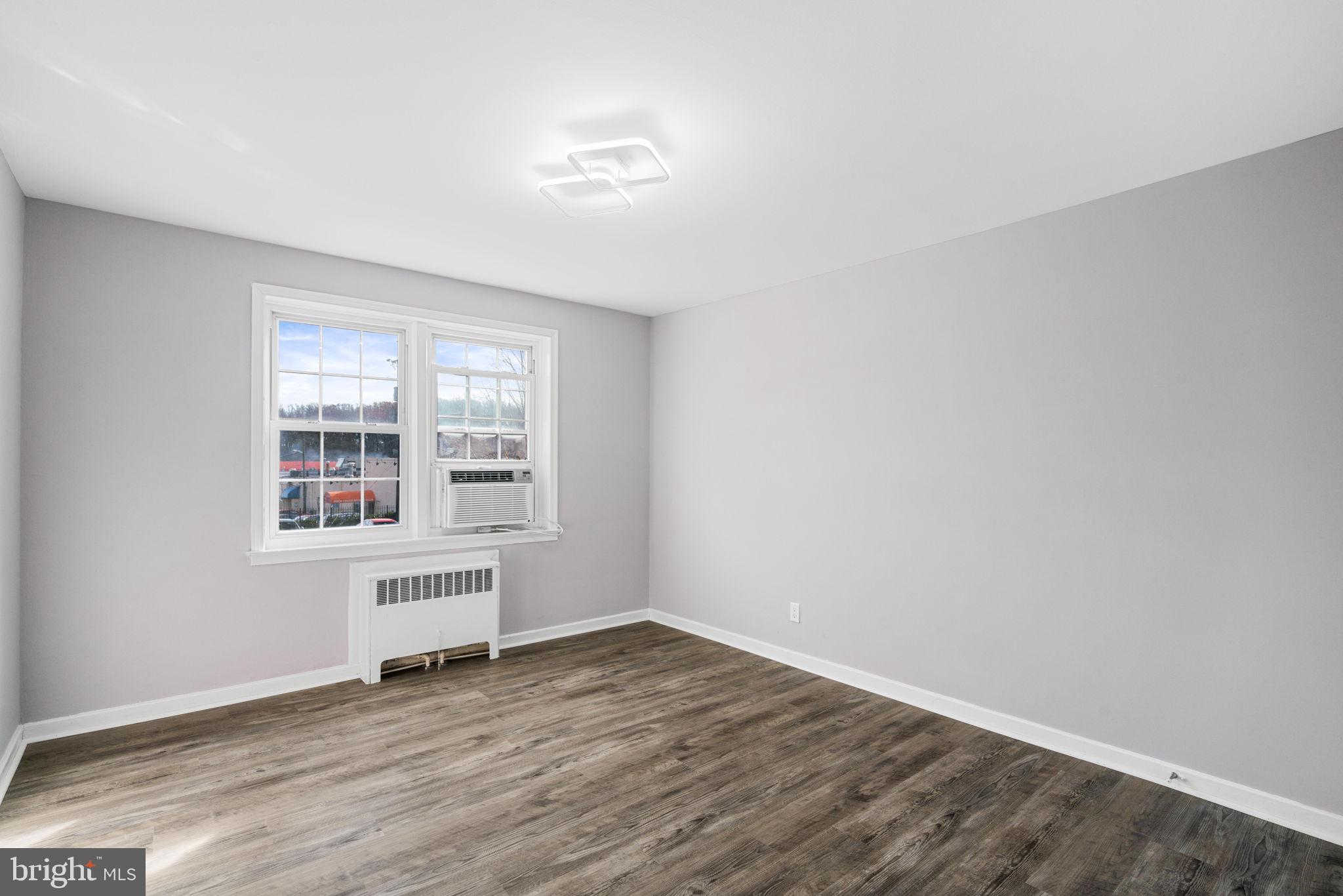 2404 Colston Drive, Unit 103 Silver Spring, MD 20910 - Photo 15 of 20 Primary Bedroom