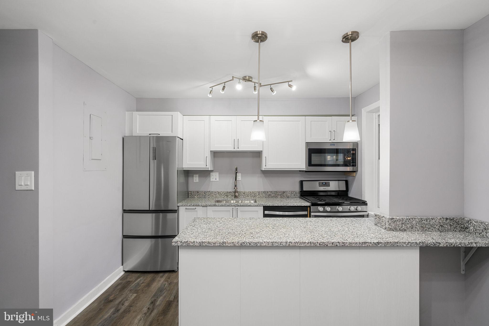 2404 Colston Drive, Unit 103 Silver Spring, MD 20910 - Photo 8 of 20 Kitchen front view from dining