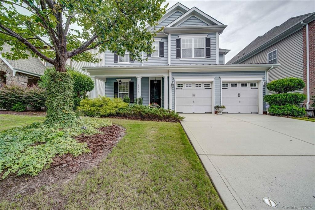 9510 Ridgeforest Drive Charlotte, NC 28277 - Photo 1 of 46 a front view of a house with garden