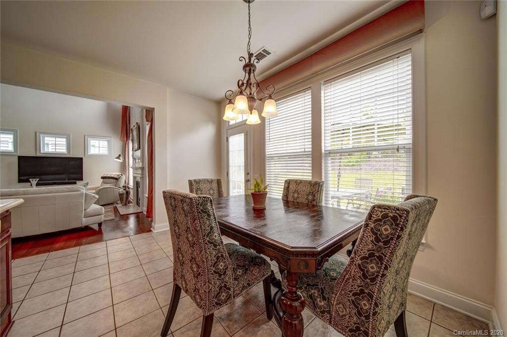 9510 Ridgeforest Drive Charlotte, NC 28277 - Photo 21 of 46 a view of a dining room with furniture window and outside view