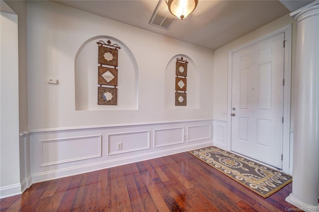 9510 Ridgeforest Drive Charlotte, NC 28277 - Photo 8 of 46 a view of an entryway with wooden floor