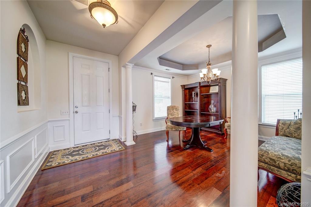 9510 Ridgeforest Drive Charlotte, NC 28277 - Photo 10 of 46 a view of a livingroom with furniture and wooden floor