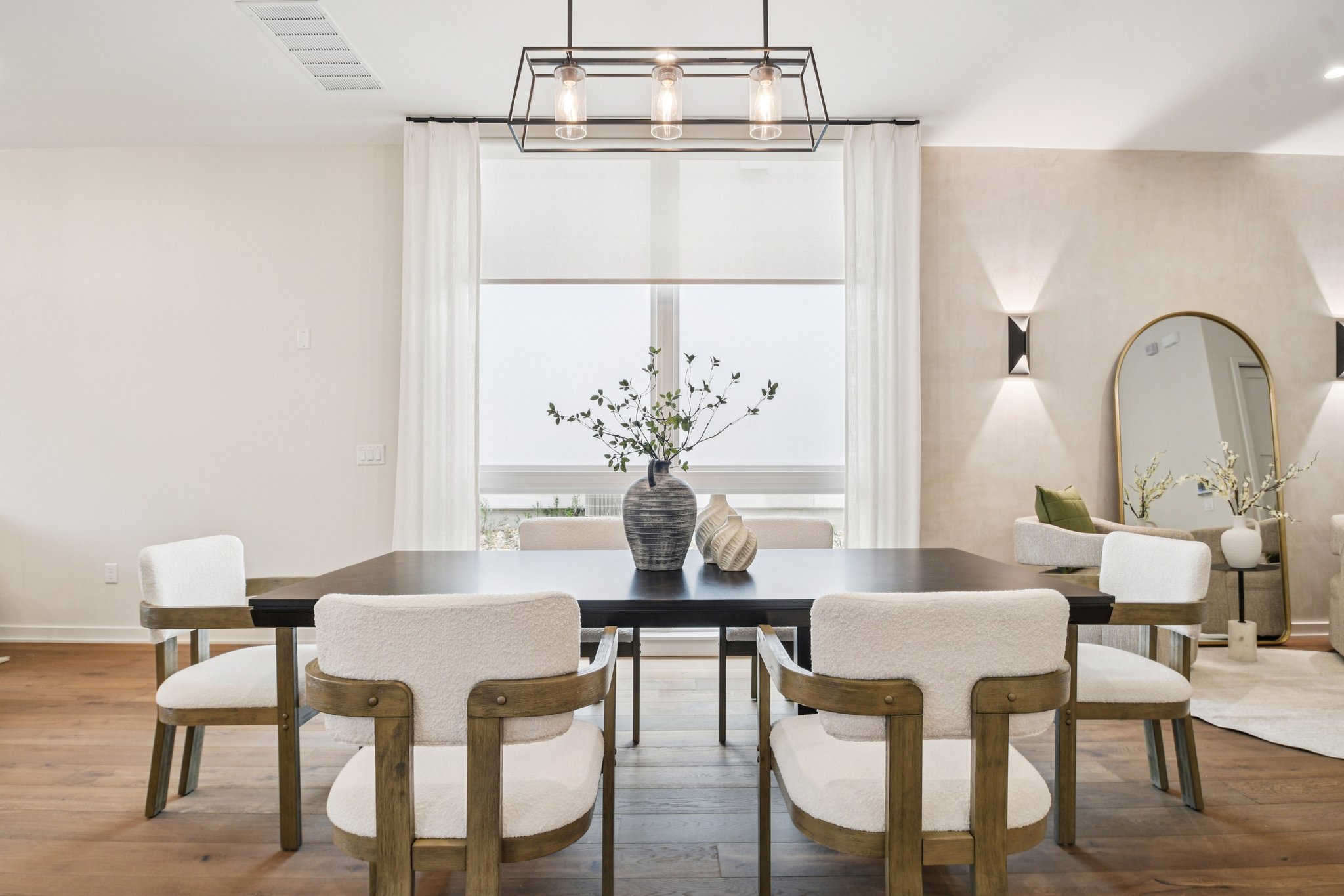 2518 Watkins Way Austin, TX 78746 - Photo 6 of 28 a view of a dining room with furniture and wooden floor
