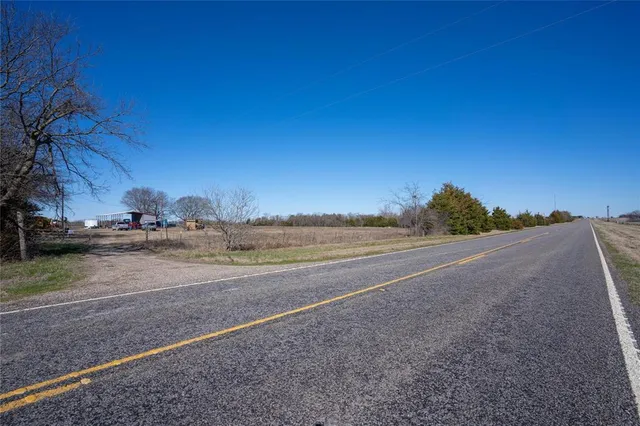 a view of a lake and a yard