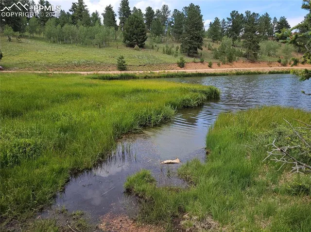 a view of lake view with outdoor space
