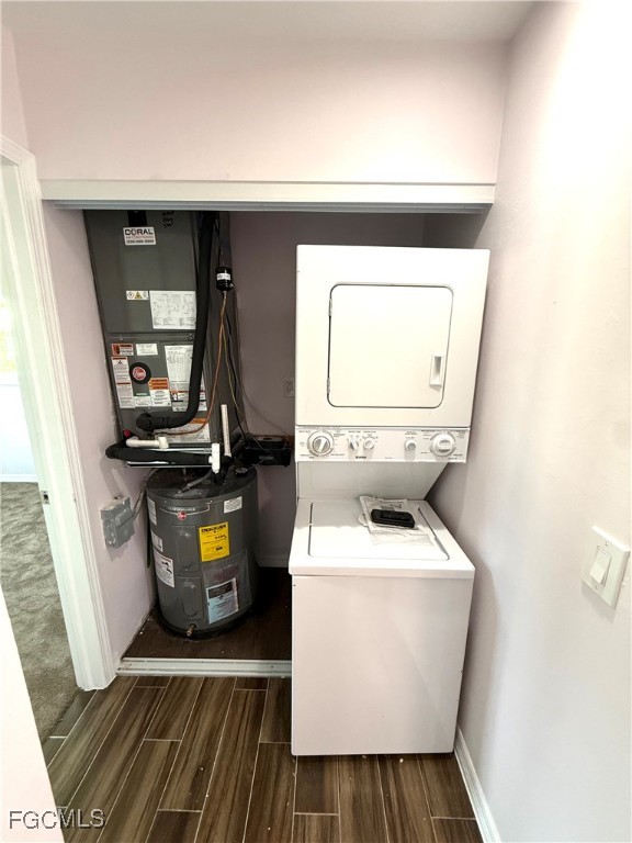 34 Hamlin Court Lehigh Acres, FL 33936 - Photo 7 of 11 a utility room with dryer and washer