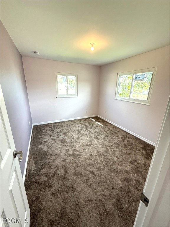 34 Hamlin Court Lehigh Acres, FL 33936 - Photo 10 of 11 a view of room