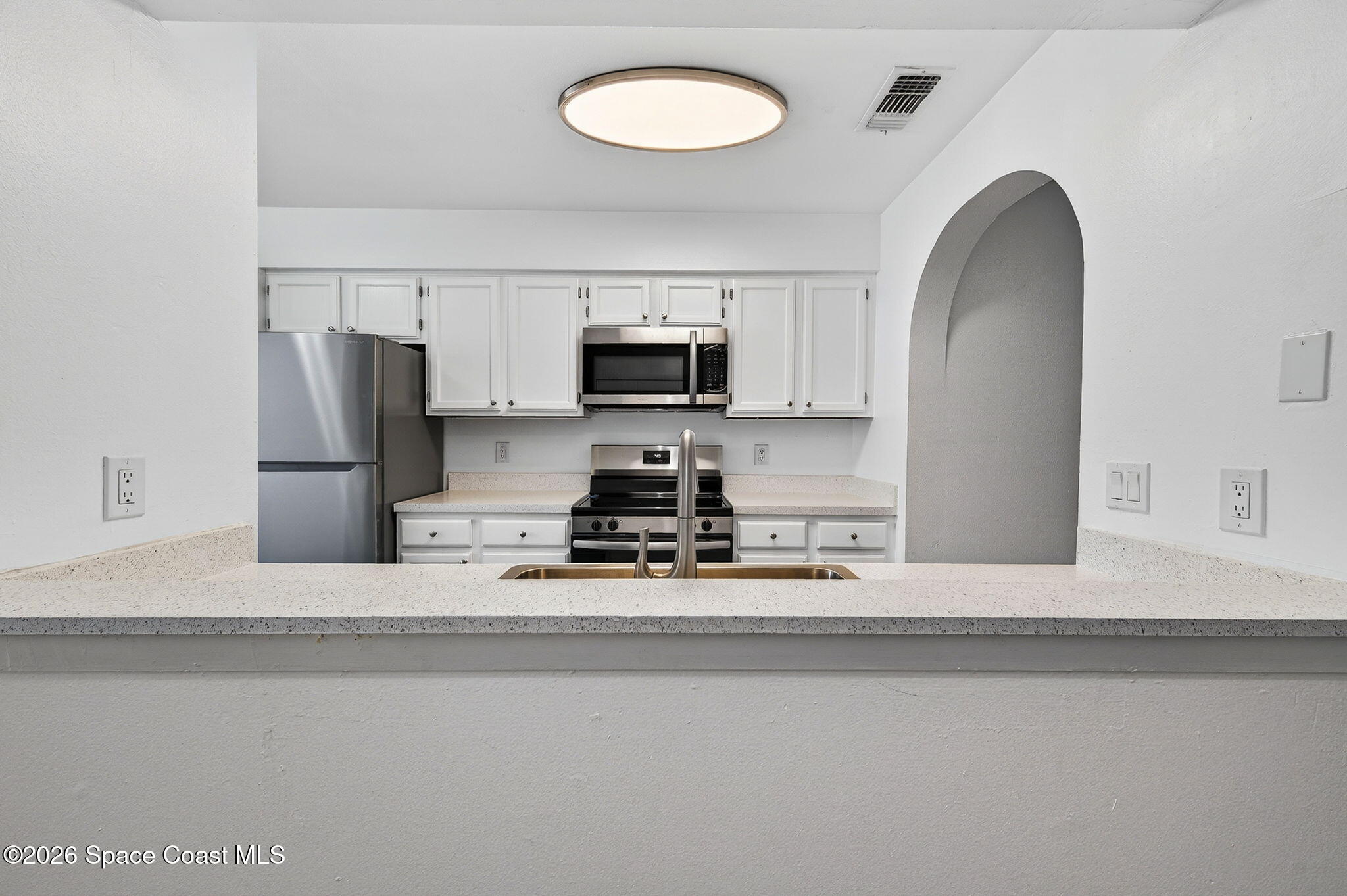 2107 Hidden Grove Lane, Unit 32B Merritt Island, FL 32953 - Photo 13 of 47 Breakfast Bar