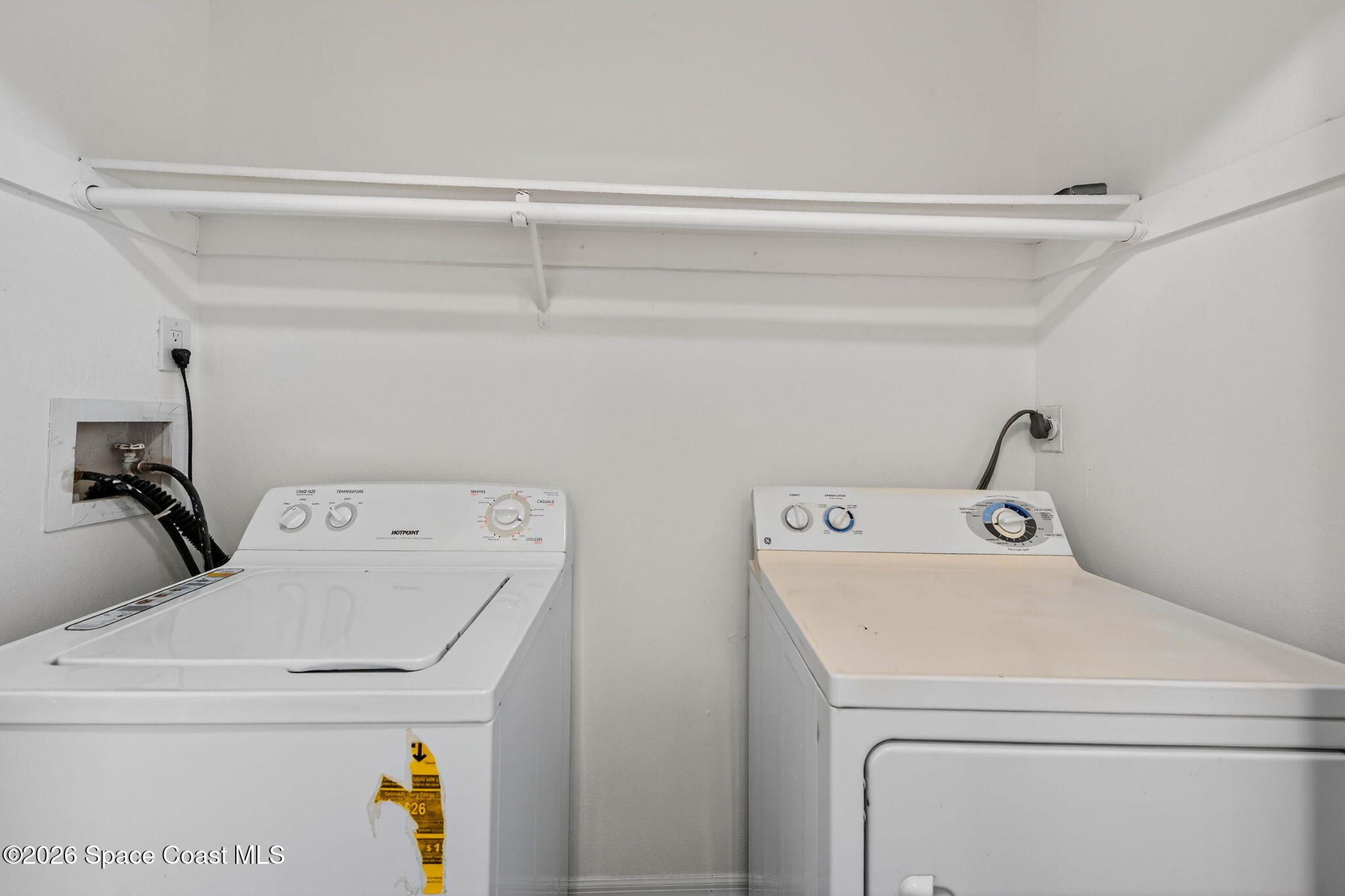 2107 Hidden Grove Lane, Unit 32B Merritt Island, FL 32953 - Photo 14 of 47 Interior Laundry with Washer and Dryer