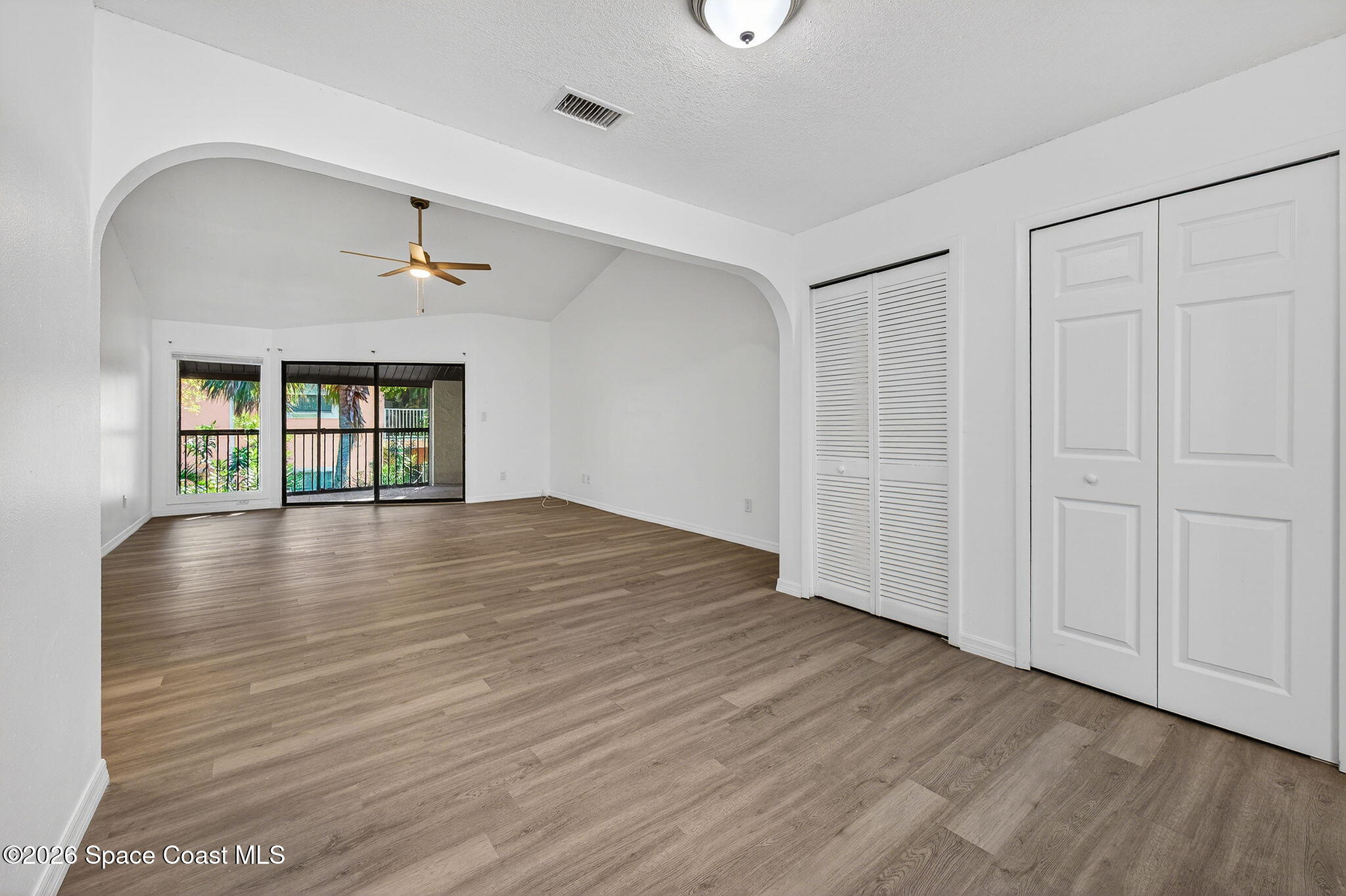 2107 Hidden Grove Lane, Unit 32B Merritt Island, FL 32953 - Photo 20 of 47 Dining Area Looking Into Family Room