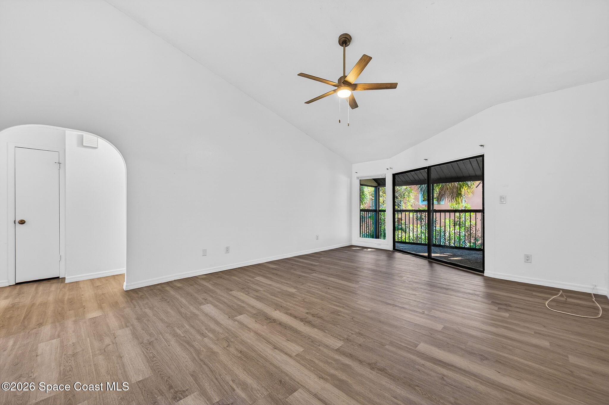 2107 Hidden Grove Lane, Unit 32B Merritt Island, FL 32953 - Photo 24 of 47 Family Room with Soaring Ceilings
