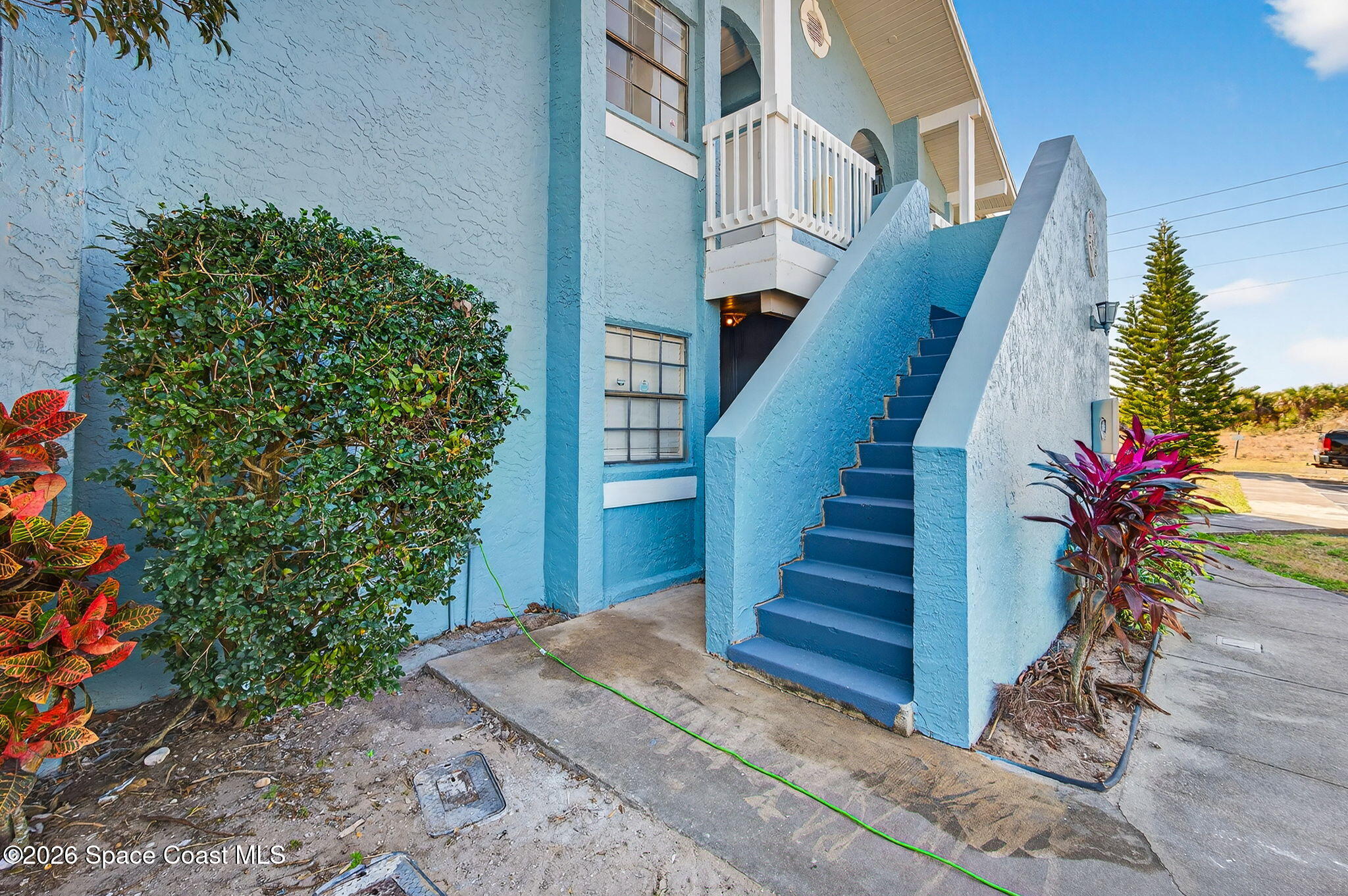 2107 Hidden Grove Lane, Unit 32B Merritt Island, FL 32953 - Photo 3 of 47 Front Stairway