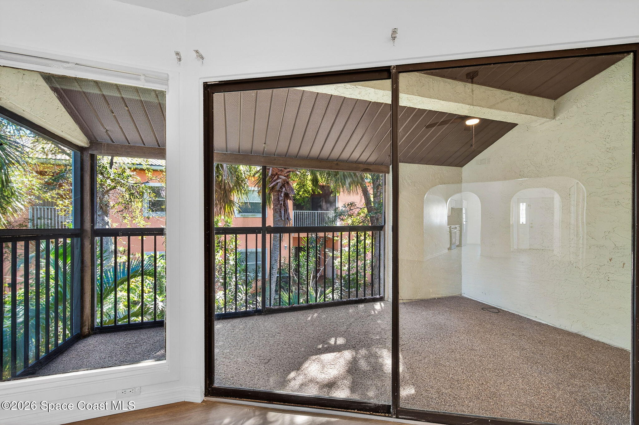 2107 Hidden Grove Lane, Unit 32B Merritt Island, FL 32953 - Photo 31 of 47 Private Screen Balcony