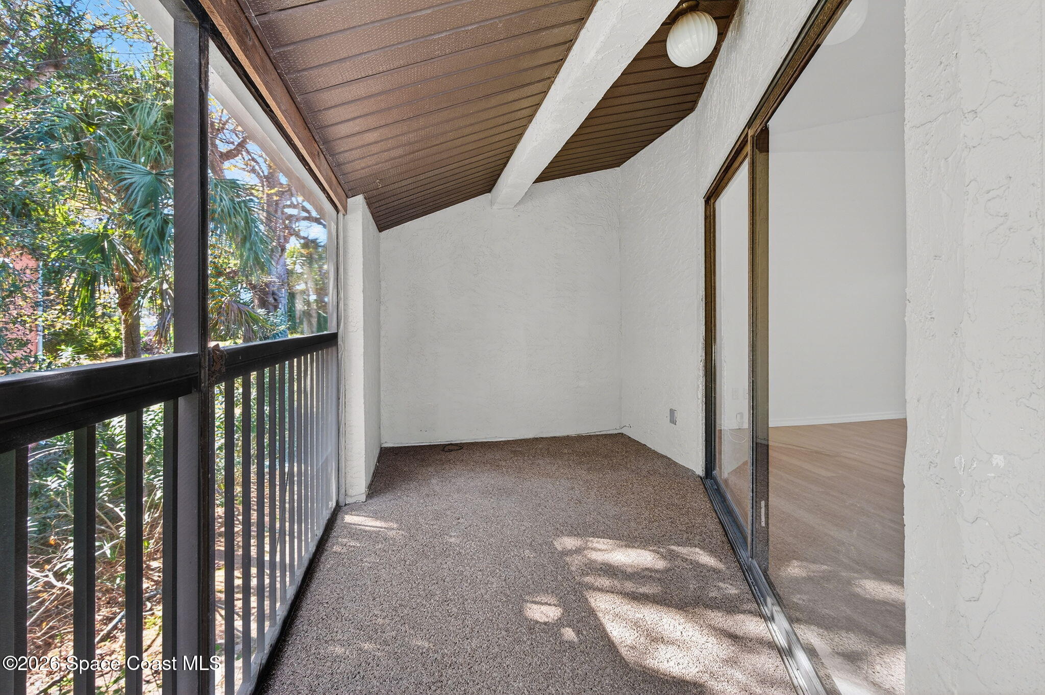 2107 Hidden Grove Lane, Unit 32B Merritt Island, FL 32953 - Photo 32 of 47 Private Screen Balcony
