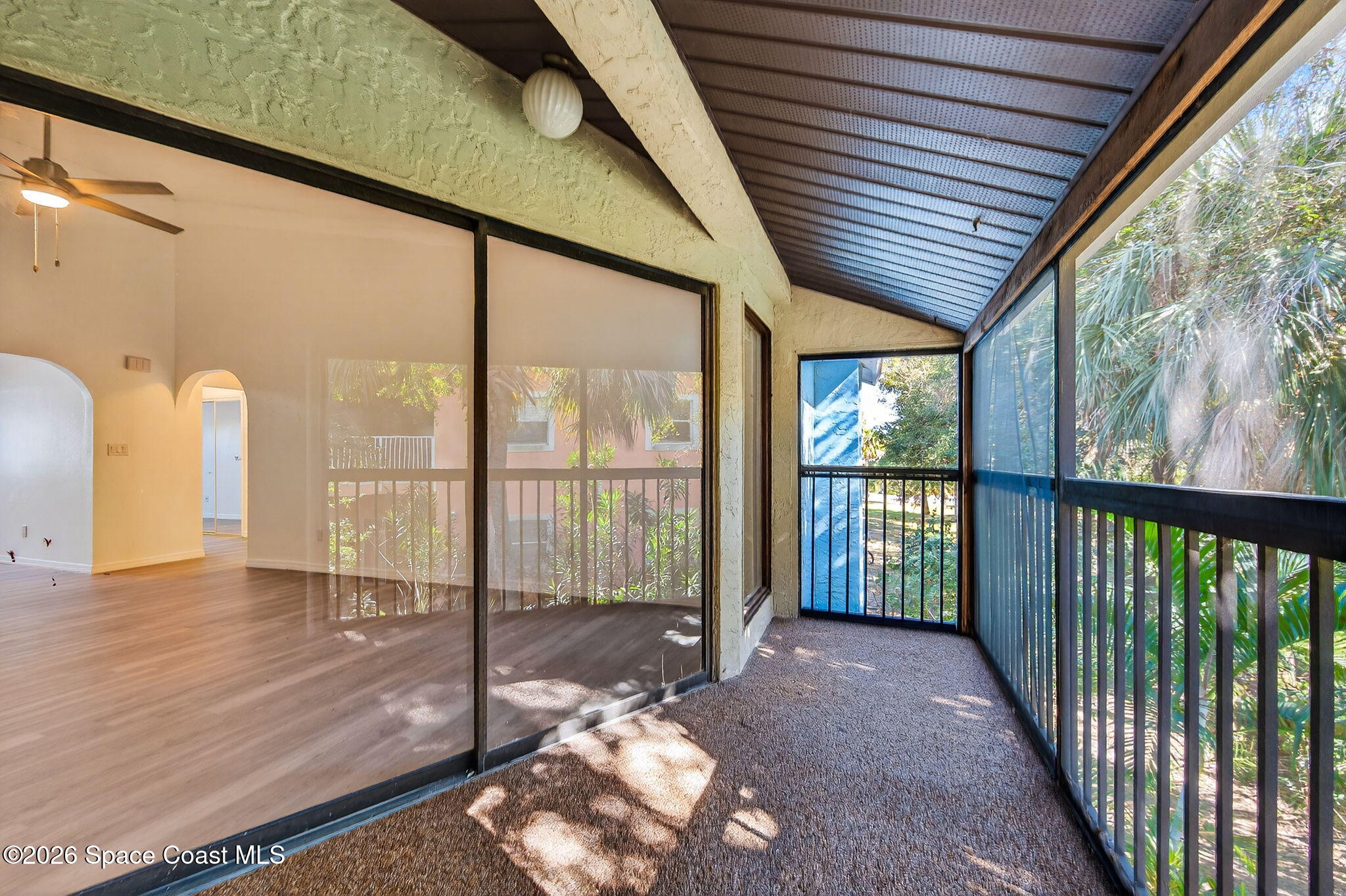 2107 Hidden Grove Lane, Unit 32B Merritt Island, FL 32953 - Photo 34 of 47 Private Screen Balcony