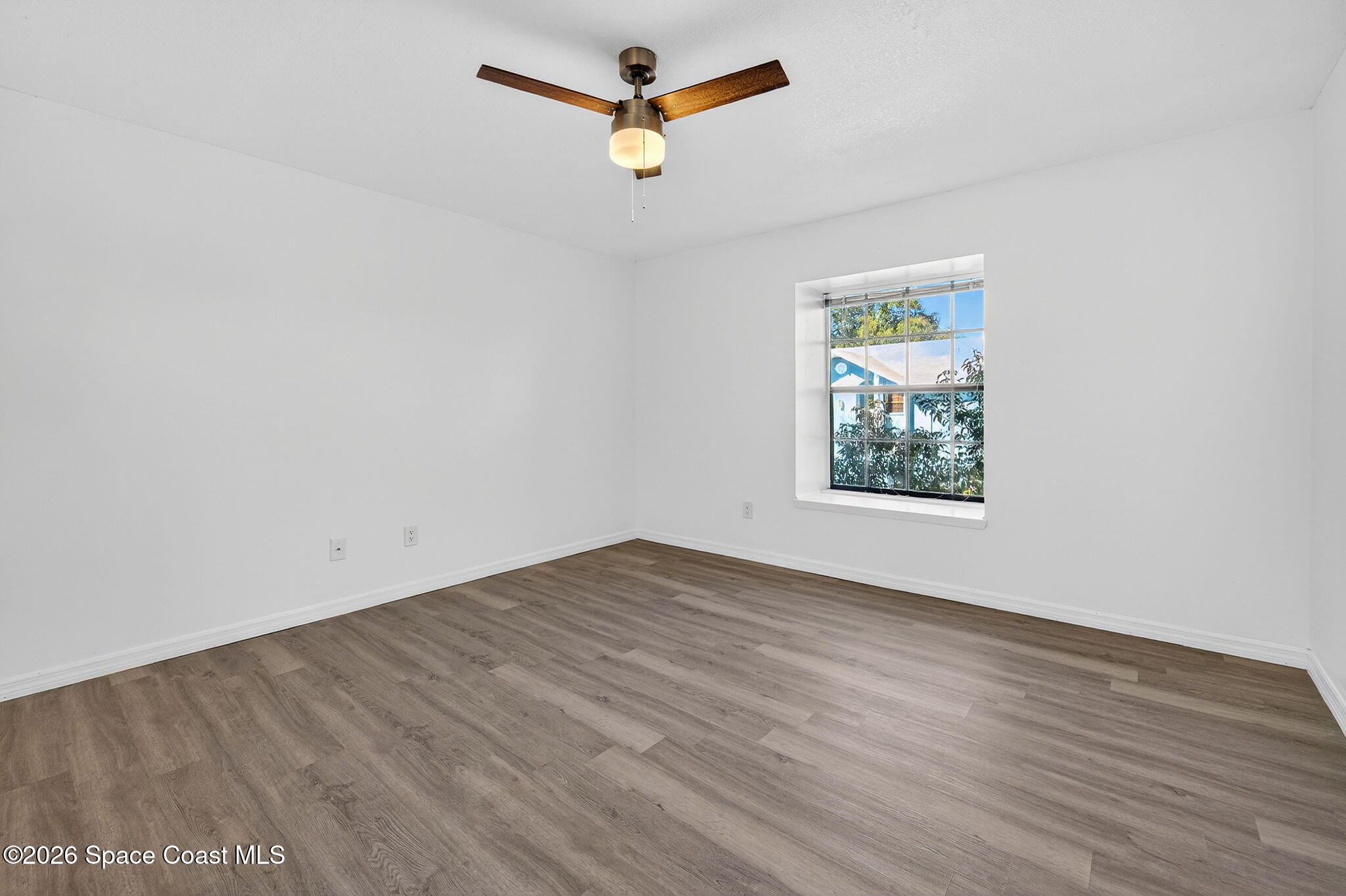 2107 Hidden Grove Lane, Unit 32B Merritt Island, FL 32953 - Photo 39 of 47 Light and Bright Master Bedroom