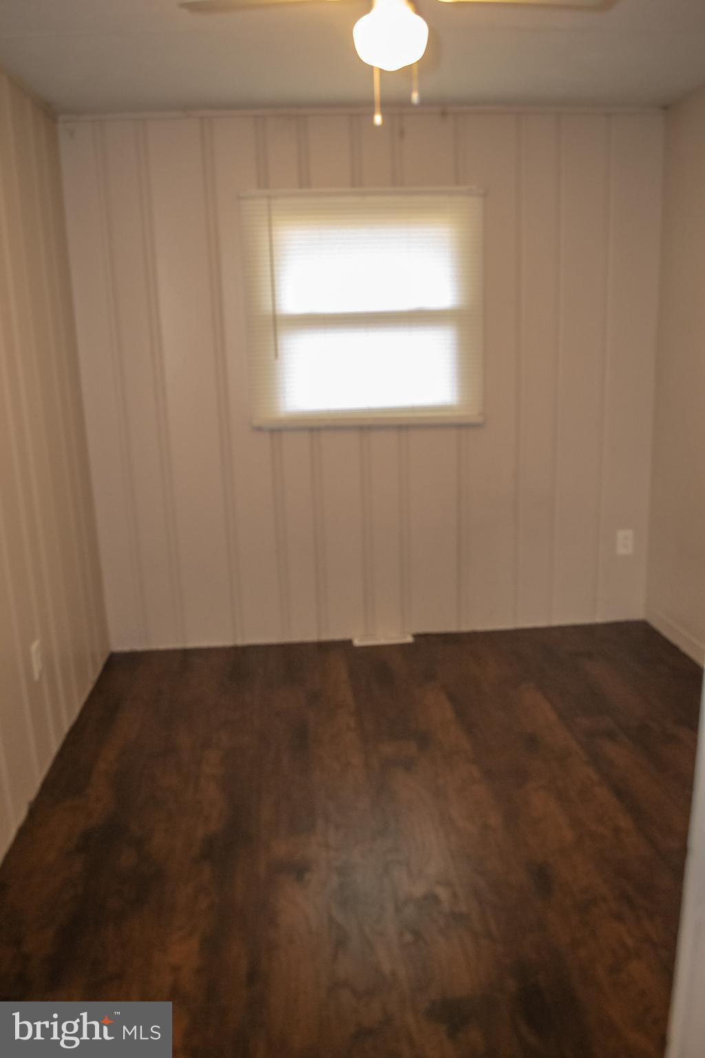 217 Walnut Alley Aberdeen, MD 21001 - Photo 5 of 13 a view of an empty room and window
