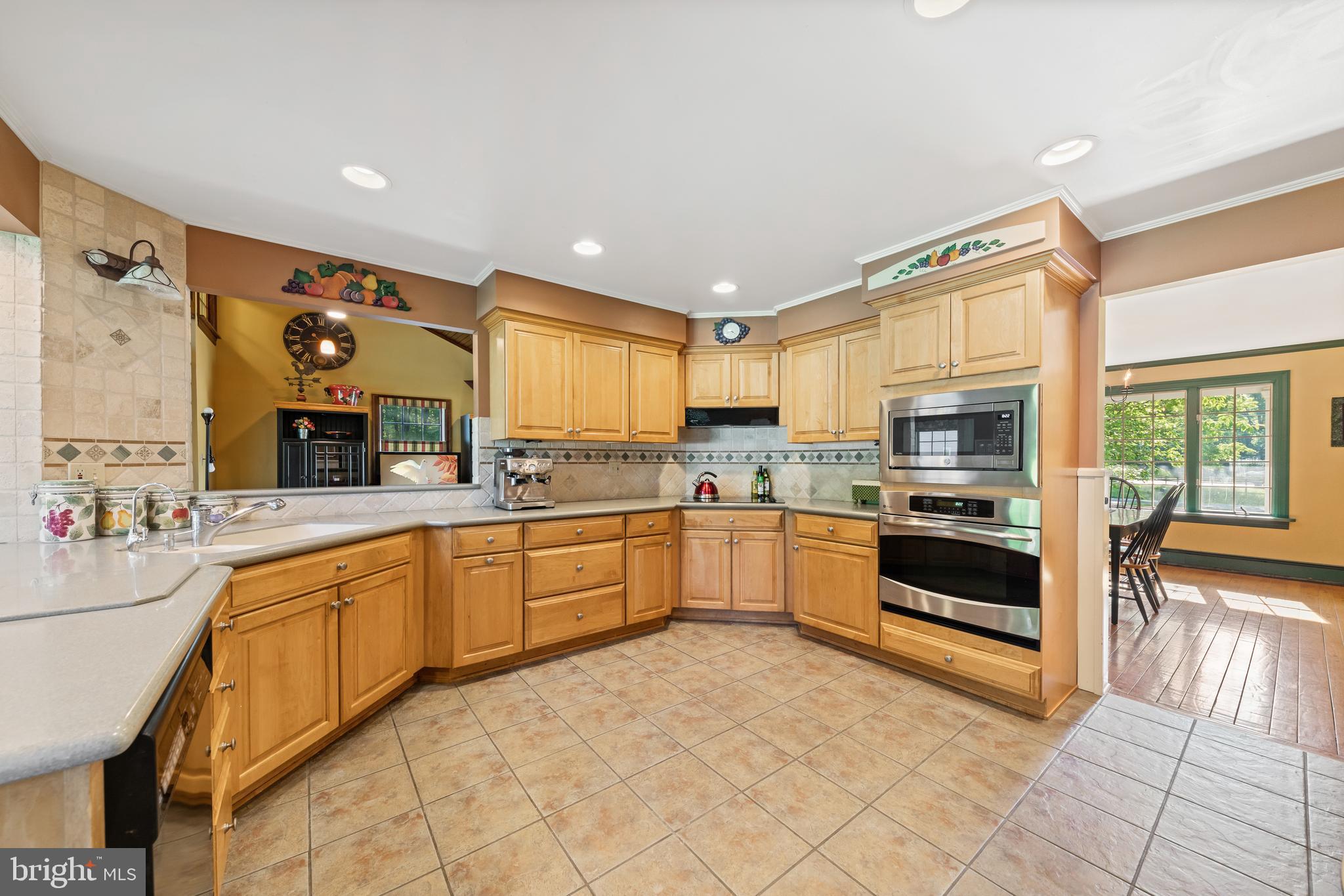 178 Lindbergh Road Hopewell, NJ 08525 - Photo 12 of 39 a large kitchen with stainless steel appliances granite countertop a stove and a sink