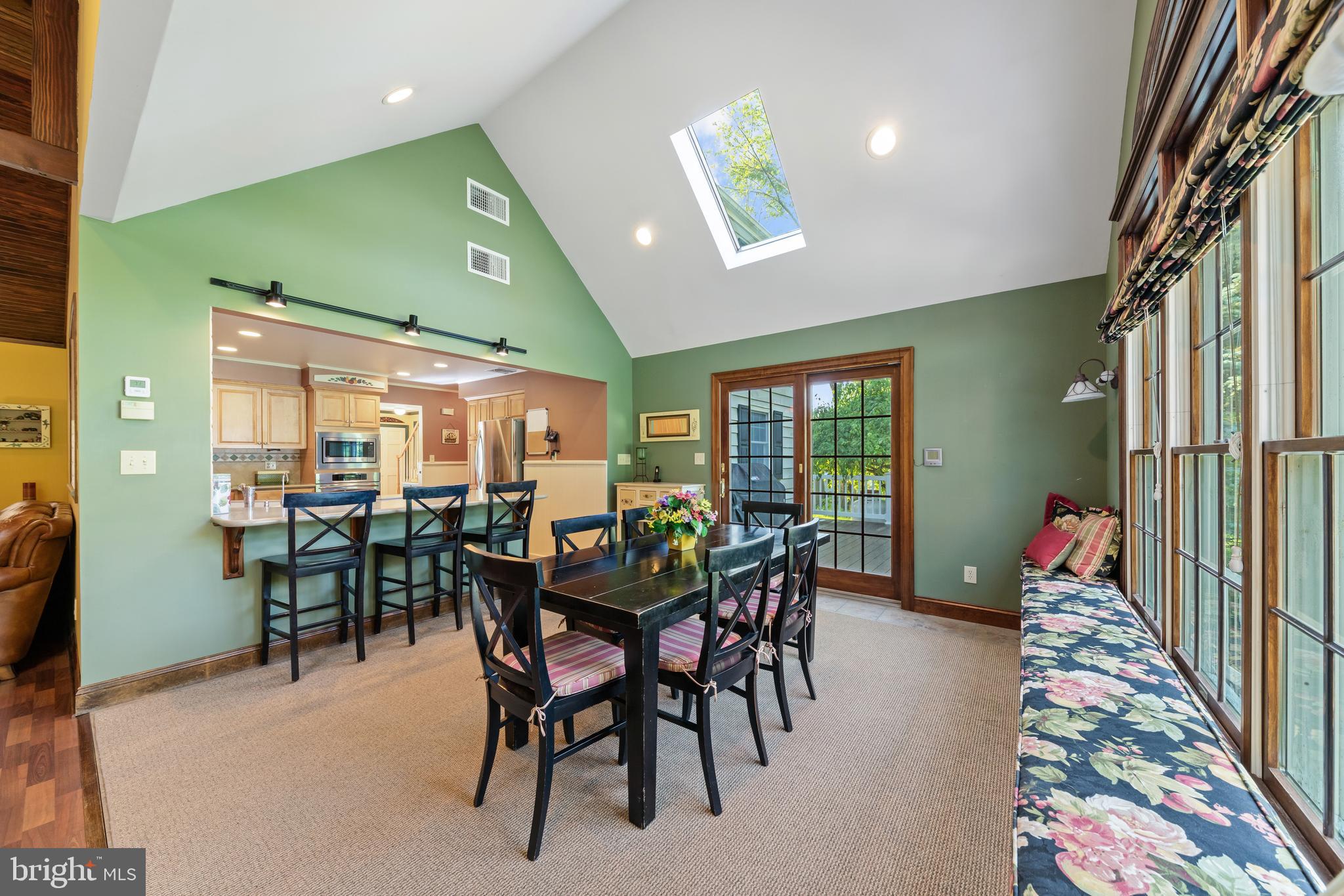 178 Lindbergh Road Hopewell, NJ 08525 - Photo 15 of 39 a view of a dining room with furniture and chandelier