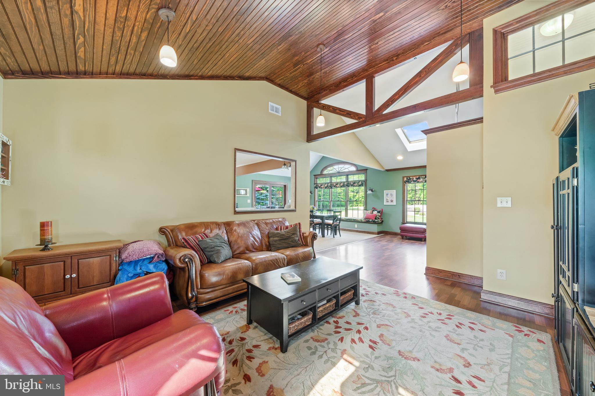 178 Lindbergh Road Hopewell, NJ 08525 - Photo 16 of 39 a living room with furniture a couch and a chandelier