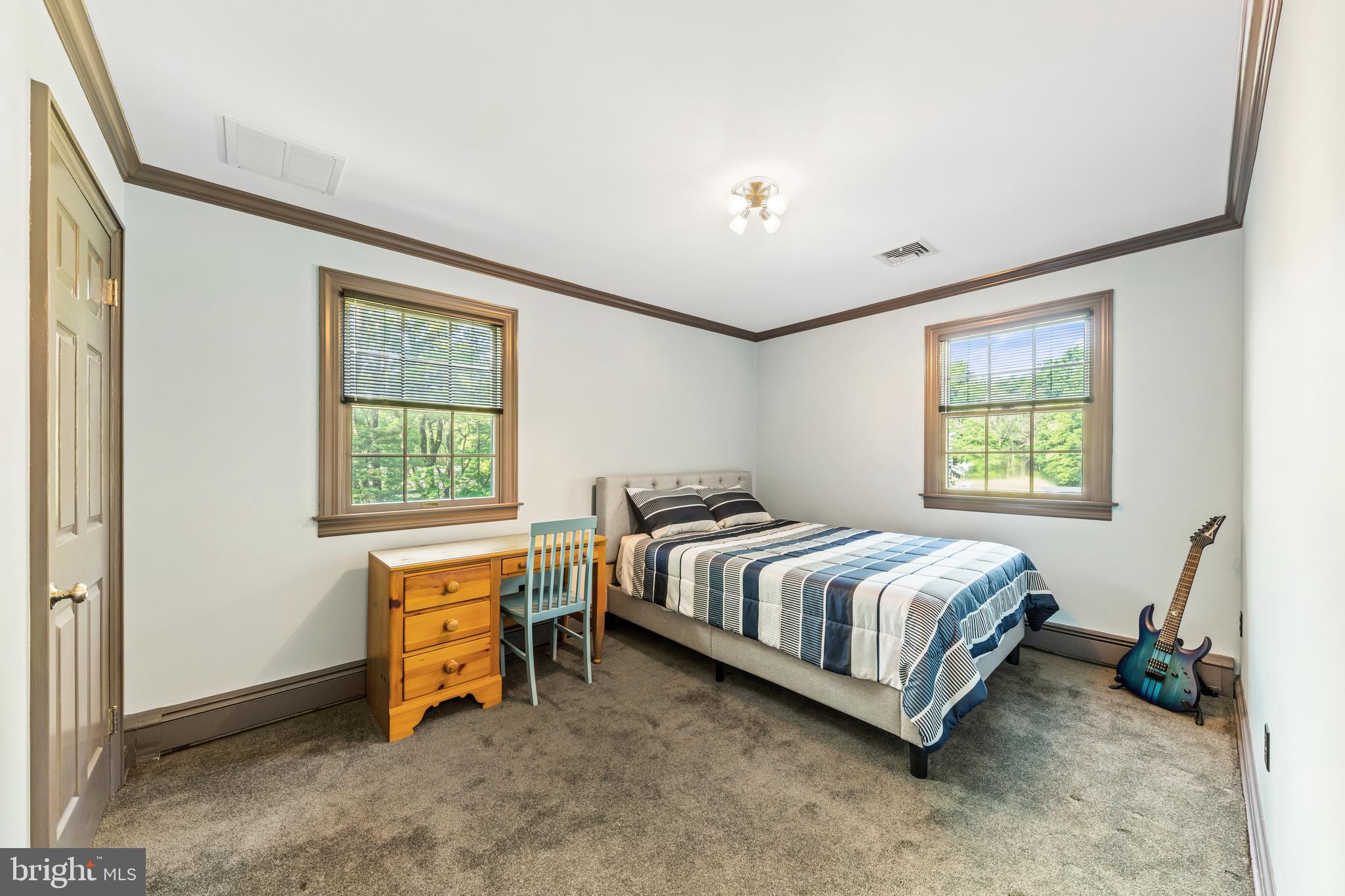 178 Lindbergh Road Hopewell, NJ 08525 - Photo 22 of 39 a room with a bed and a window