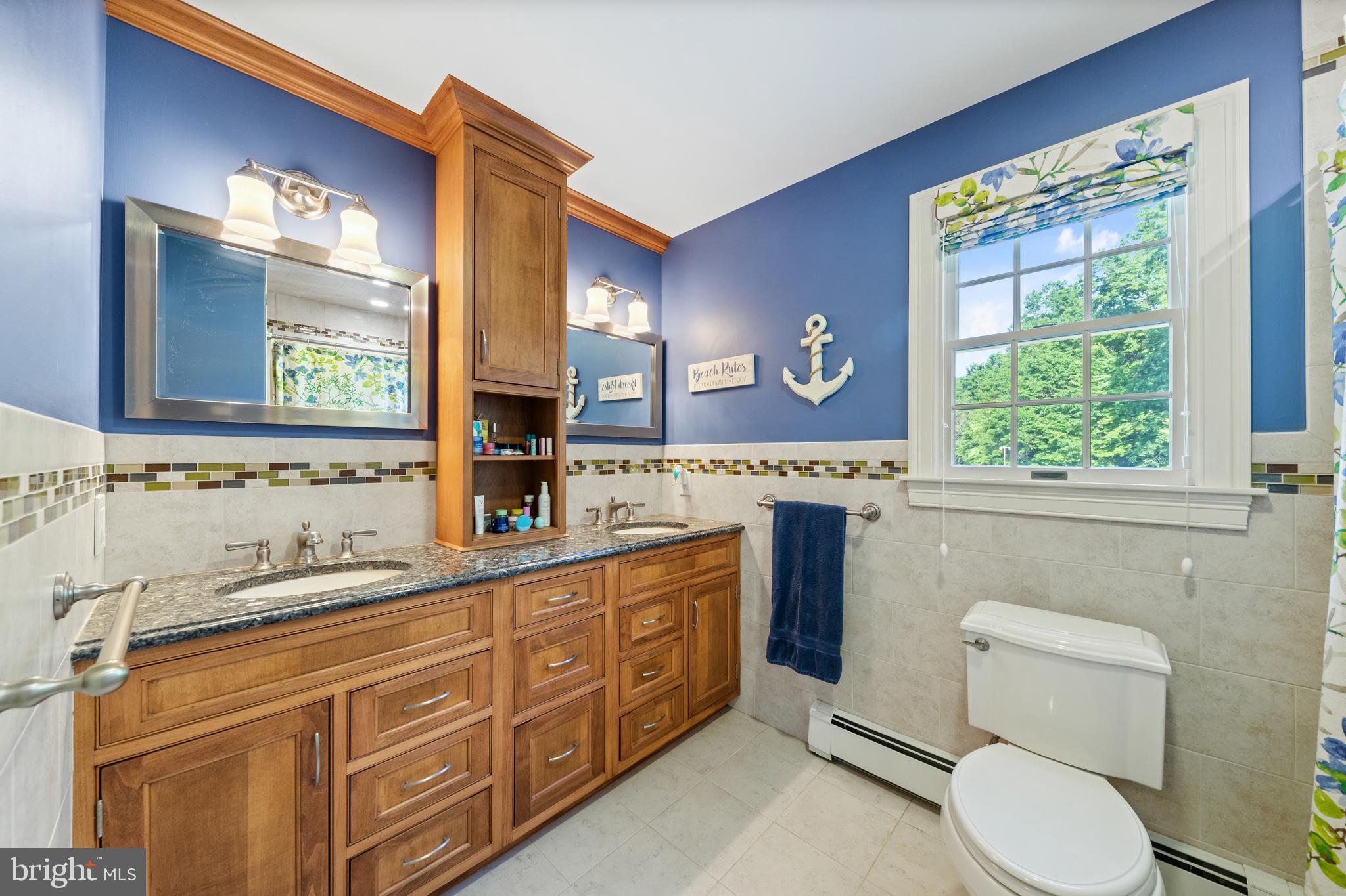 178 Lindbergh Road Hopewell, NJ 08525 - Photo 25 of 39 a bathroom with a granite countertop toilet sink and mirror