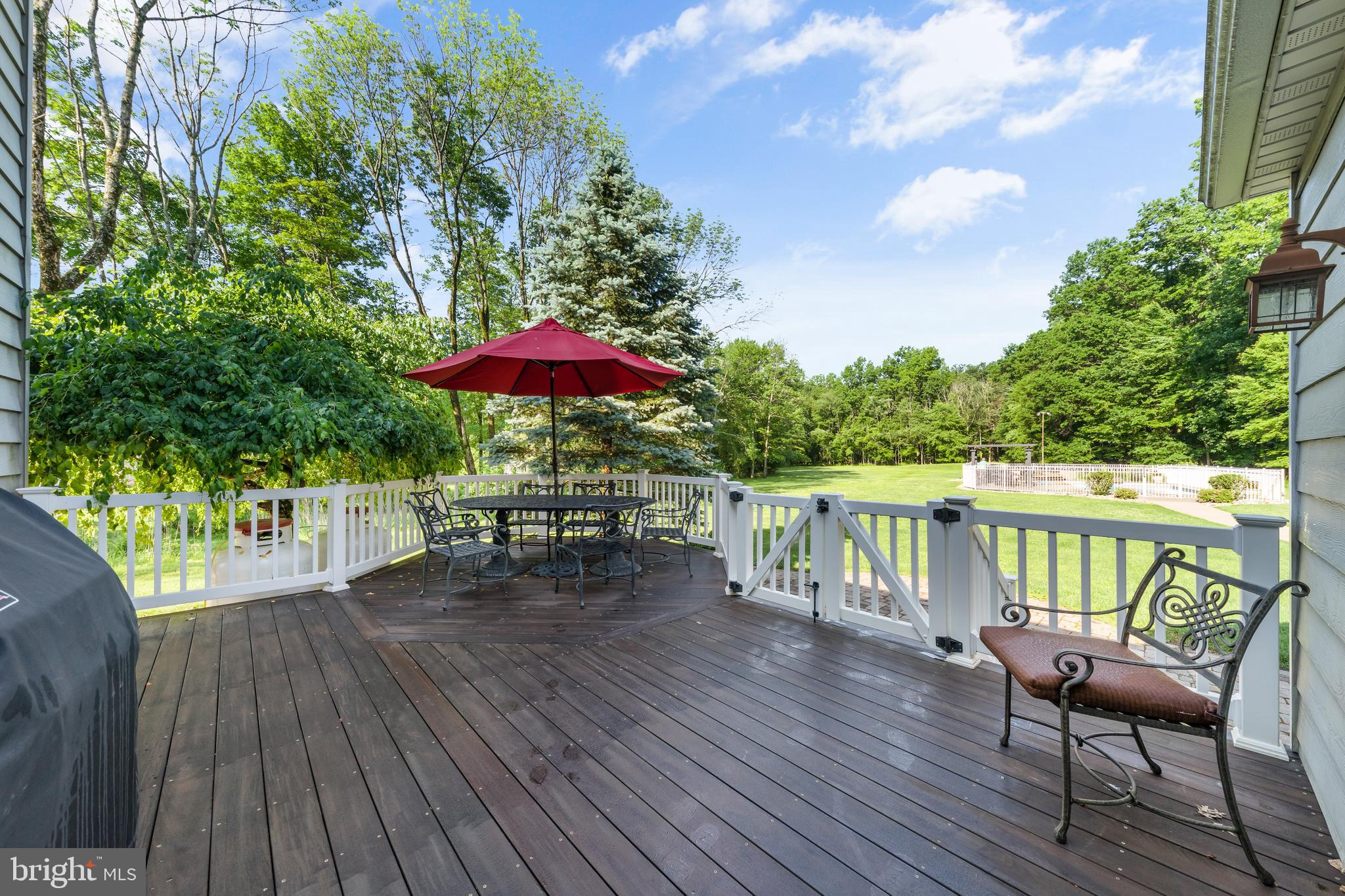 178 Lindbergh Road Hopewell, NJ 08525 - Photo 32 of 39 an outdoor sitting area with hardwood