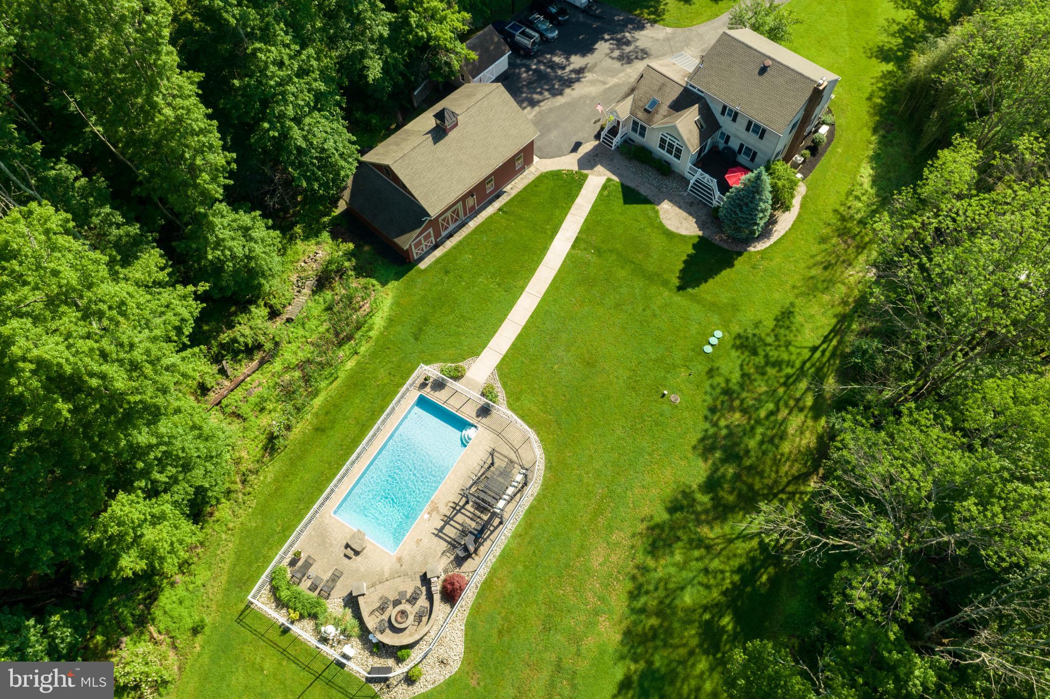 178 Lindbergh Road Hopewell, NJ 08525 - Photo 38 of 39 an aerial view of a house with a garden and swimming pool