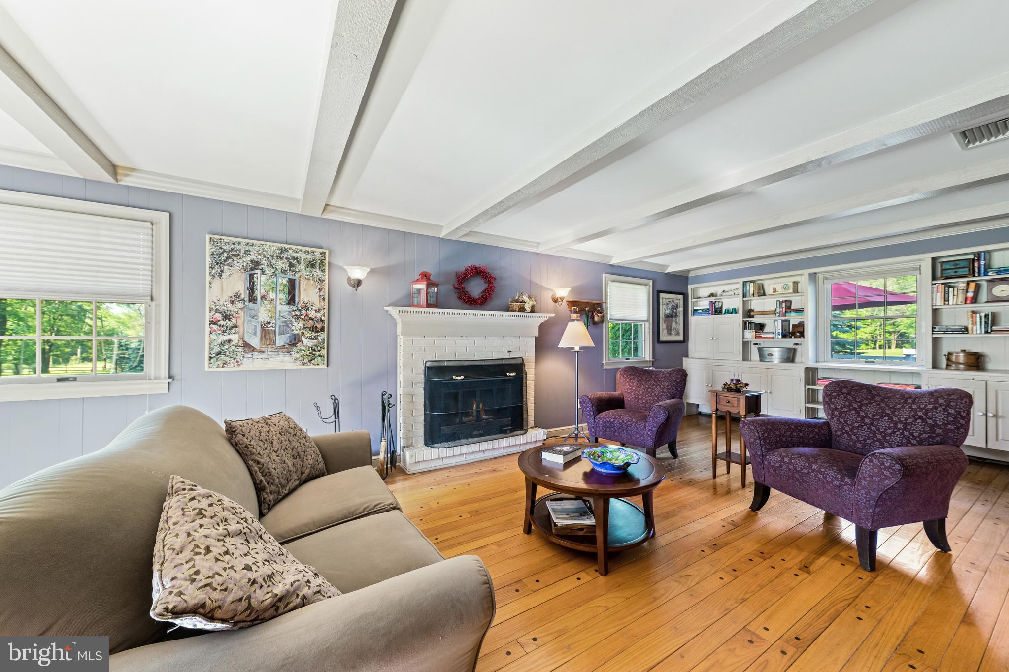 178 Lindbergh Road Hopewell, NJ 08525 - Photo 5 of 39 a living room with furniture and a fireplace