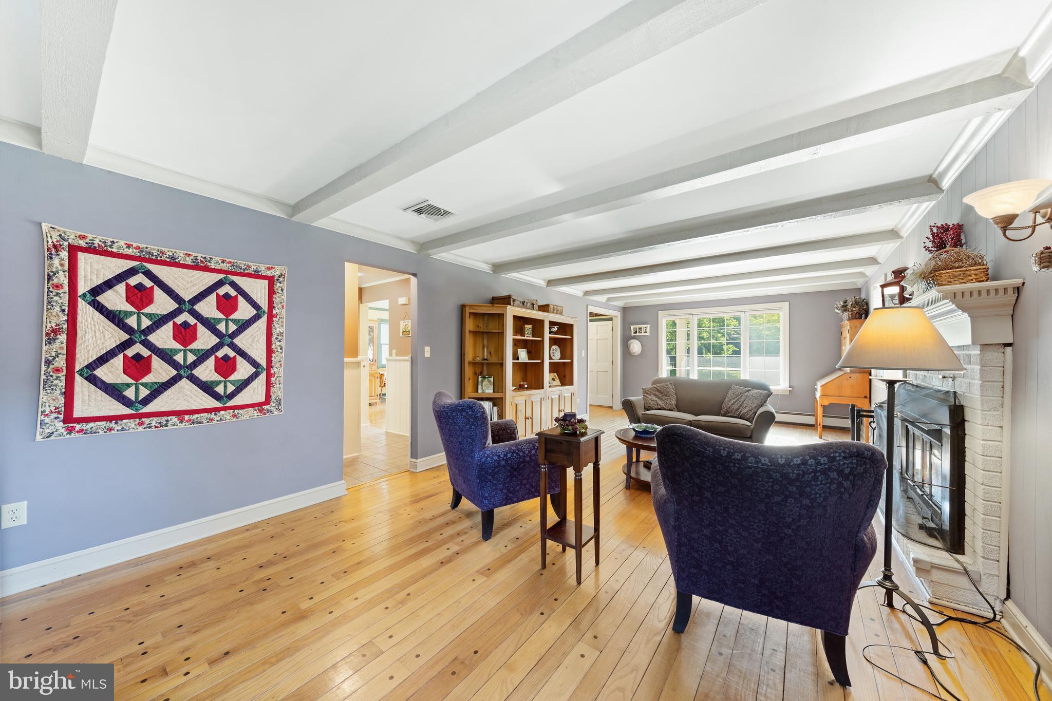178 Lindbergh Road Hopewell, NJ 08525 - Photo 7 of 39 a living room with furniture and a wooden floor