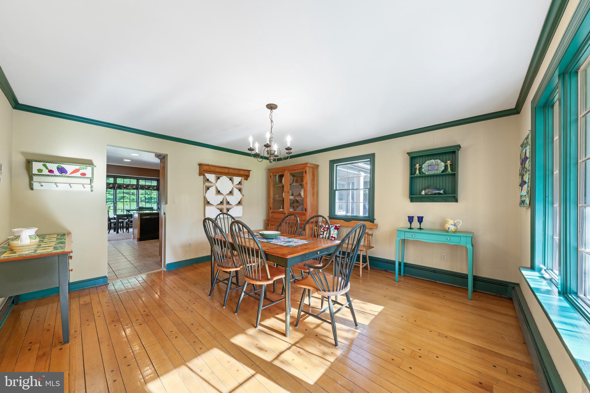 178 Lindbergh Road Hopewell, NJ 08525 - Photo 9 of 39 a view of a dining room with furniture window and wooden floor