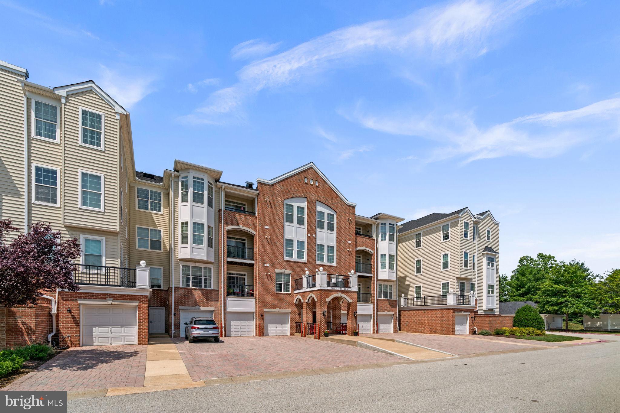 7315 Maplecrest Road, Unit 104 Elkridge, MD 21075 - Photo 47 of 58 a front view of a building with street view