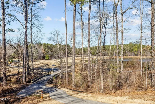 a view of a lake with a big yard