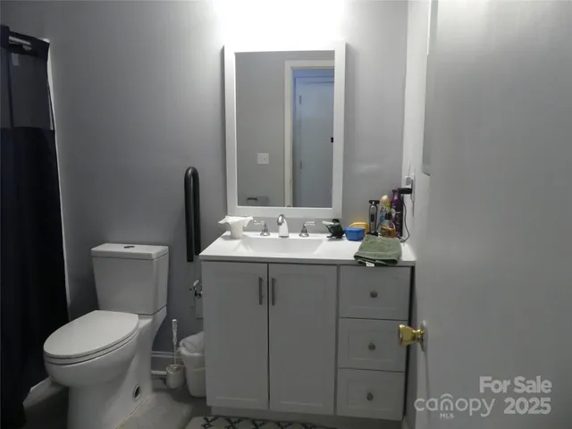 a bathroom with a sink and a toilet