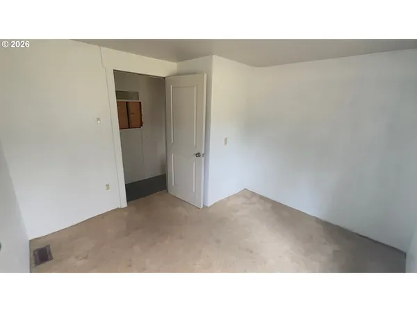 a open hall with a bench