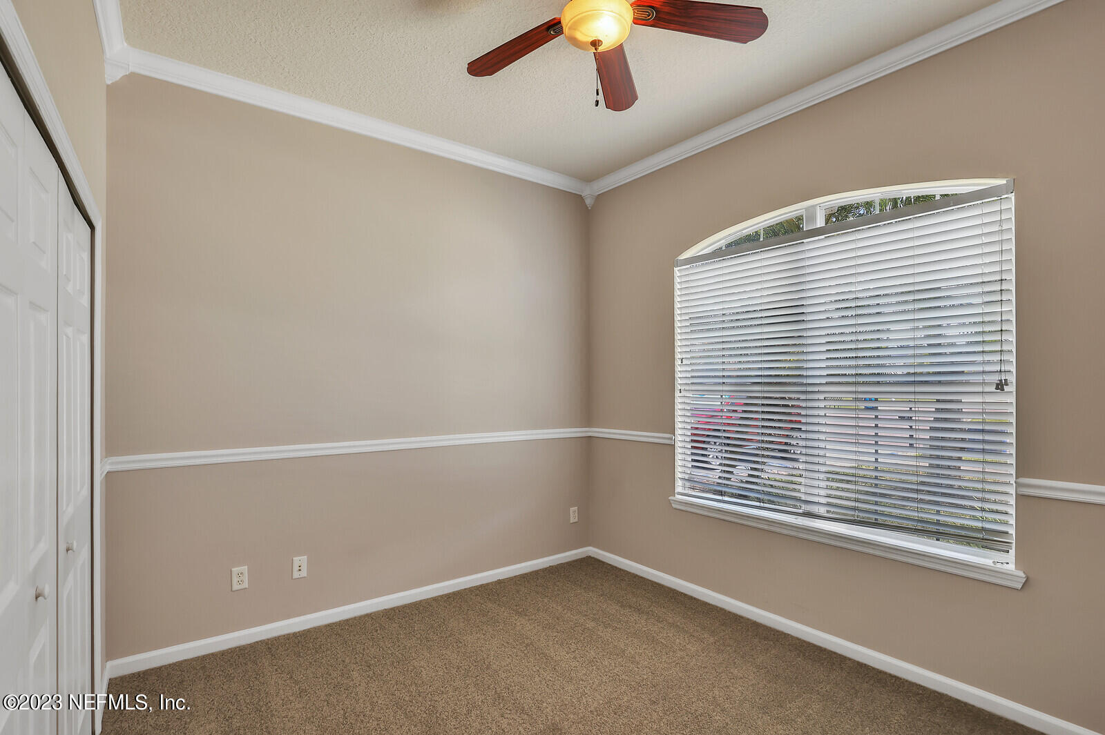 860 Briarcreek Road Jacksonville, FL 32225 - Photo 16 of 24 a view of an empty room with a window