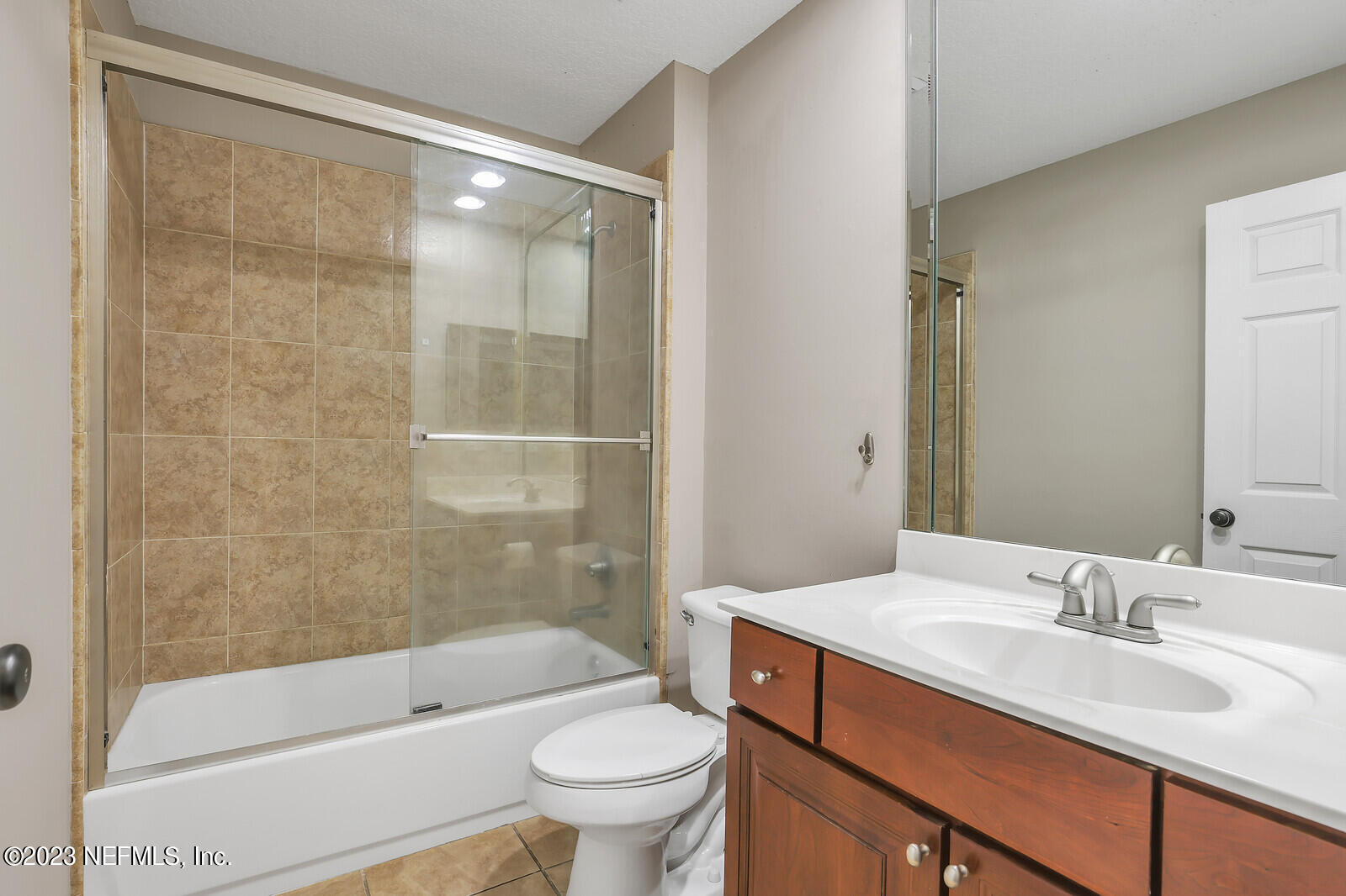 860 Briarcreek Road Jacksonville, FL 32225 - Photo 19 of 24 a bathroom with a sink toilet and shower