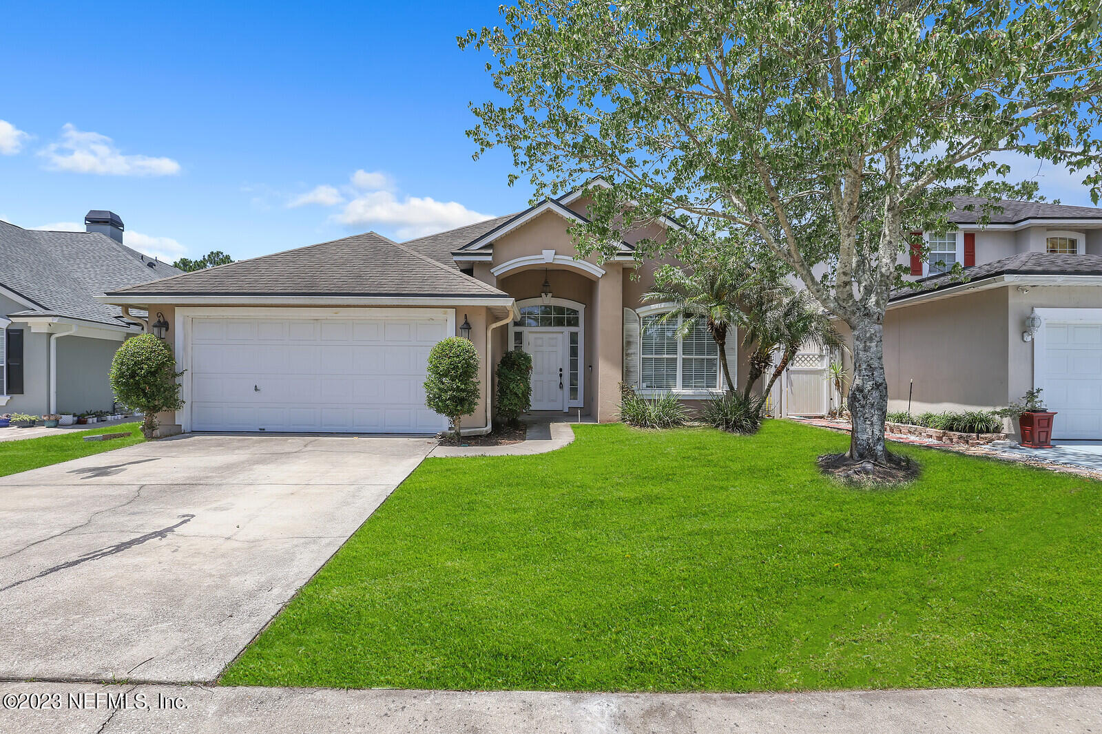 860 Briarcreek Road Jacksonville, FL 32225 - Photo 2 of 24 front view of a house with a yard