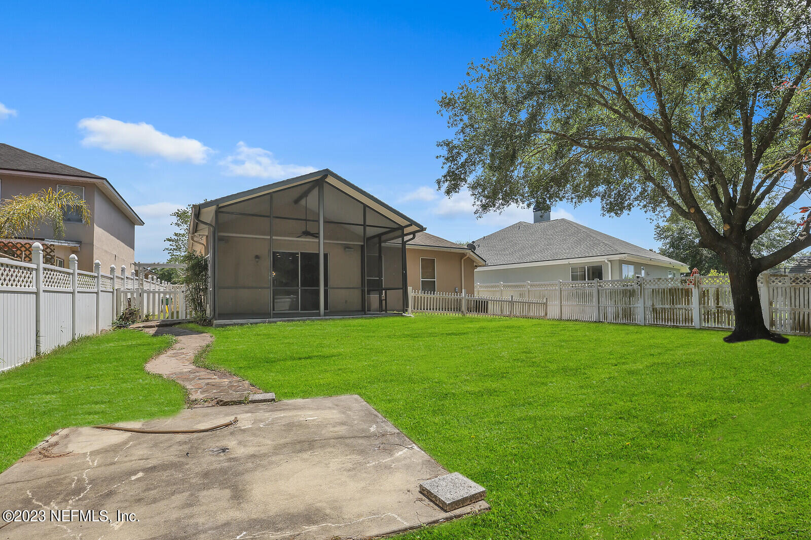 860 Briarcreek Road Jacksonville, FL 32225 - Photo 22 of 24 a front view of a house with a yard