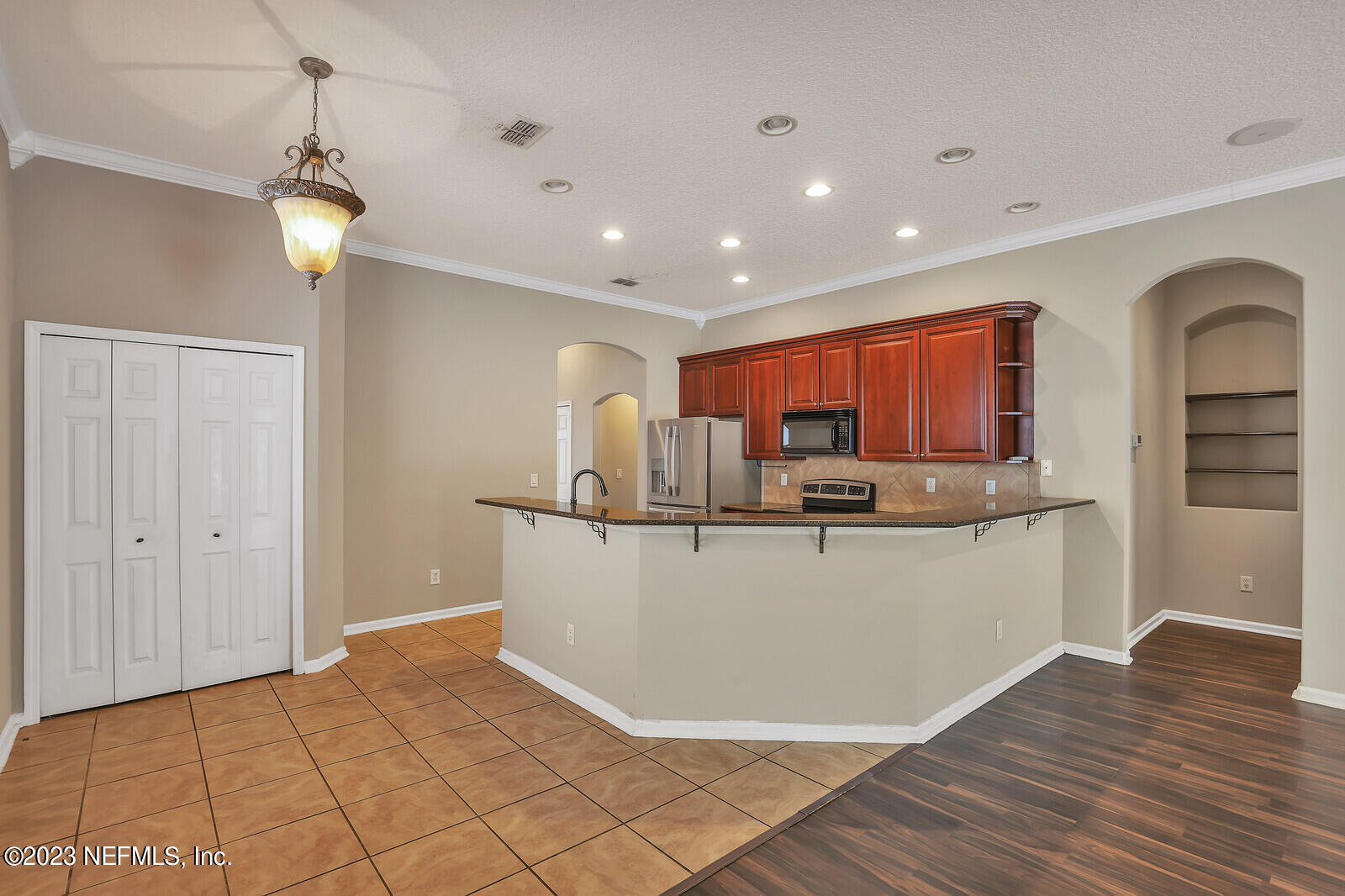 860 Briarcreek Road Jacksonville, FL 32225 - Photo 6 of 24 a view of living room with furniture and wooden floor