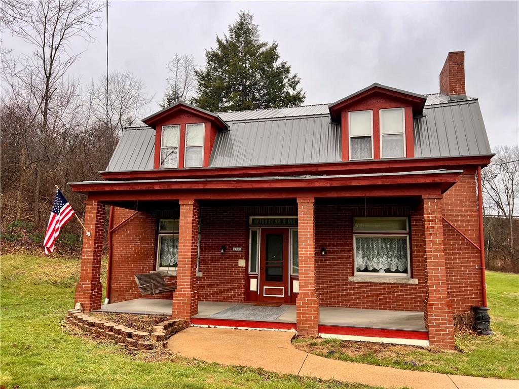 a view of house with outdoor space
