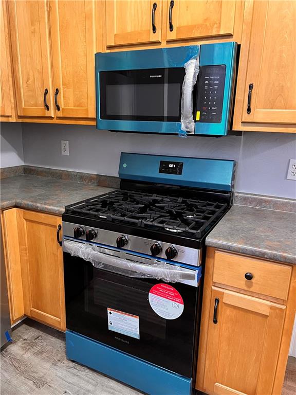 1299 Old State Road Apollo, PA 15613 - Photo 12 of 29 a stove top oven sitting inside of a kitchen