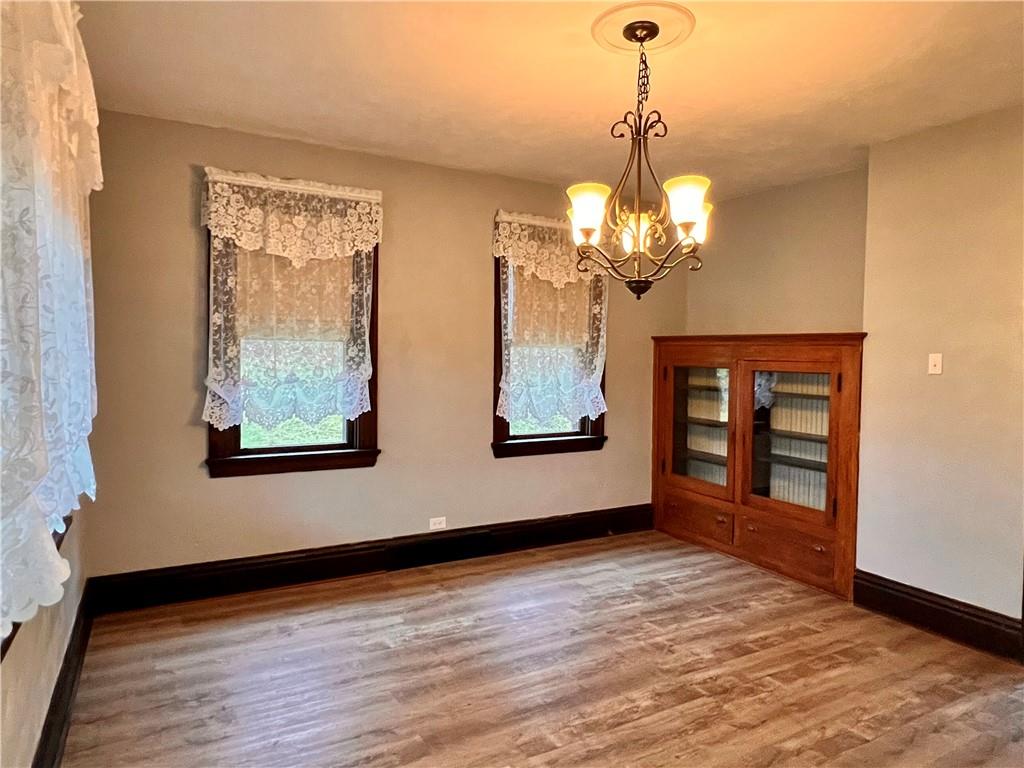 1299 Old State Road Apollo, PA 15613 - Photo 20 of 29 a view of an empty room with wooden floor and a window