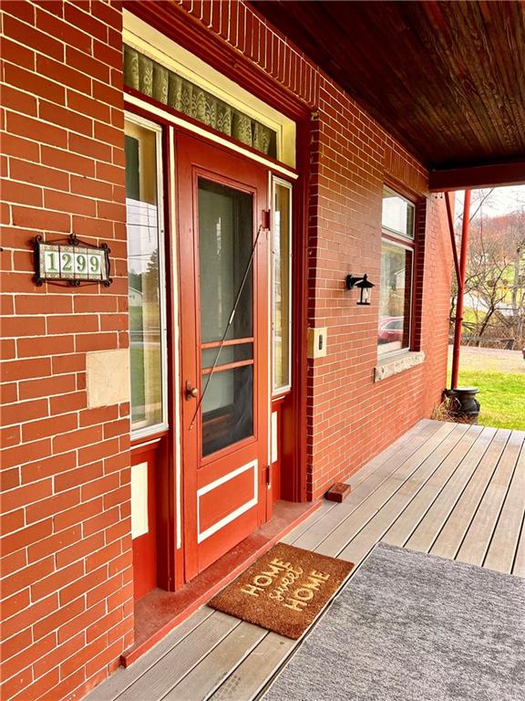1299 Old State Road Apollo, PA 15613 - Photo 5 of 29 a view of a brick house with a large window