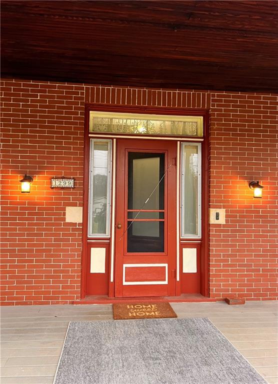 1299 Old State Road Apollo, PA 15613 - Photo 8 of 29 a view of a brick house with a large window