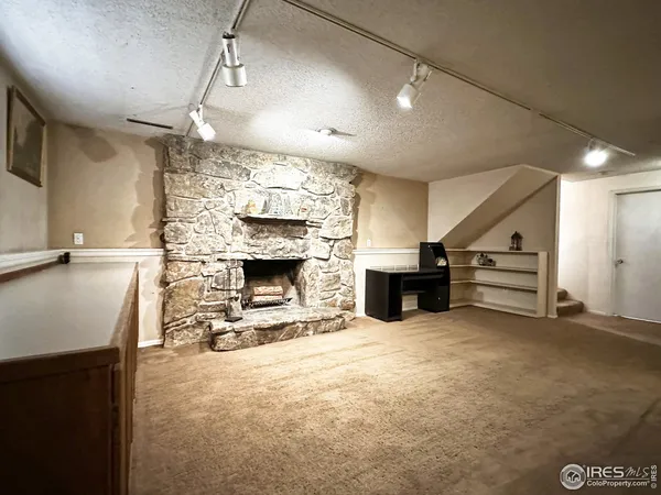 a view of a livingroom with a fireplace