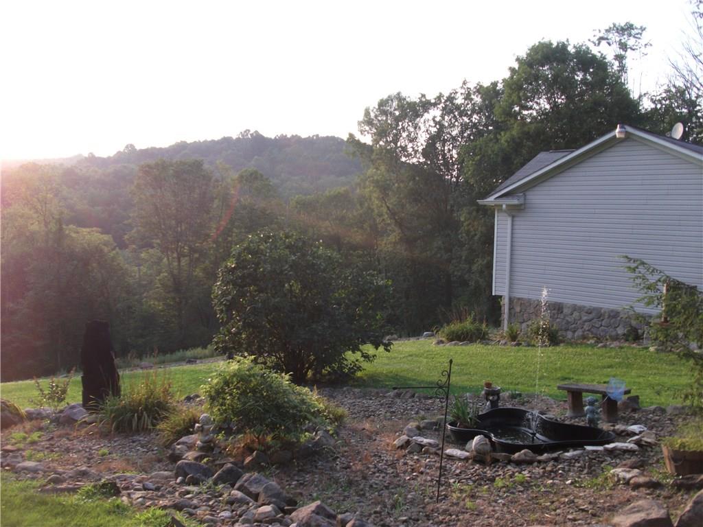 1152 Snake Run Road Wampum, PA 16157 - Photo 3 of 25 enjoy the sunsets and the woods with nothing but trees to look at