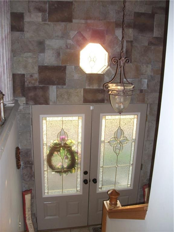 1152 Snake Run Road Wampum, PA 16157 - Photo 8 of 25 beautiful entry with stone and tile accents