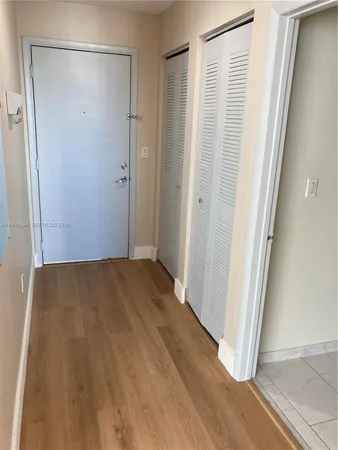 a front view of a building with glass windows